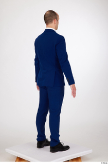  Serban a poses black oxford shoes blue suit blue suit jacket blue suit trousers blue tie business dressed standing whole body 0006.jpg